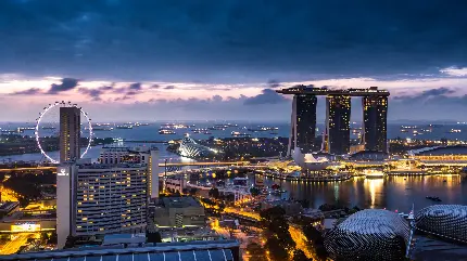 عکس جالب و منحصر به فرد ساختمان و برج های بلند سنگاپور در شب