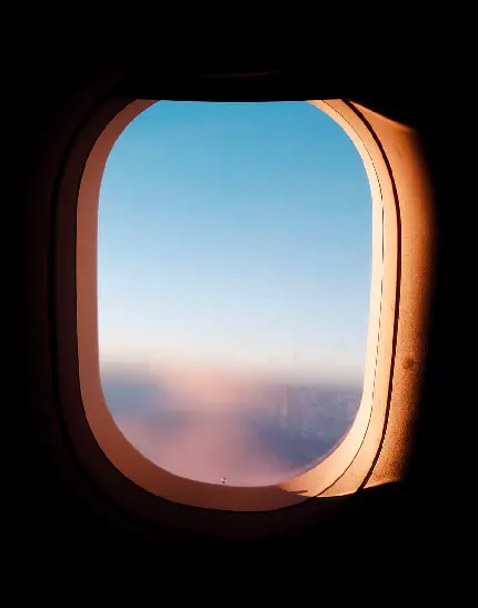 دانلود عکس پرطرفدار پنجره شیشه ای هواپیما از فاصله نزدیک 