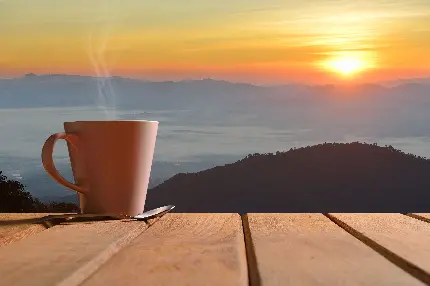 تصویر زمینه مینیمال قهوه صبحگاهی داغ در دامان طبیعت