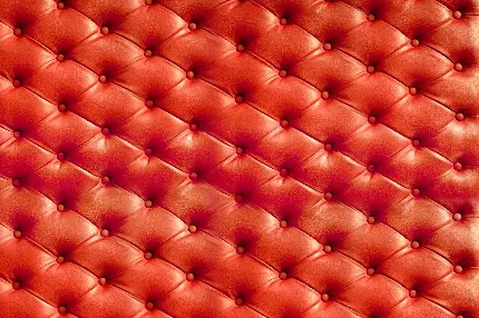 تصویر استوک خوشگل بافت چرم قرمز رنگ مبل و کاناپه از نزدیک