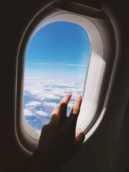 عکس پشت پنجره هواپیما مناسب استوری های فیک و لاکچری