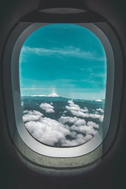 دانلود بک گراند ابرها از پشت پنجره شیشه ای پیشرفته هواپیما 