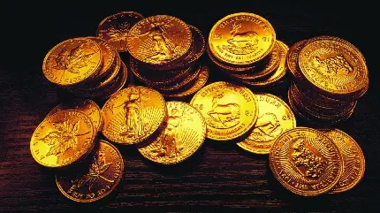 دانلود رایگان عکس زمینه جذاب از سکه های طلای چیده شده