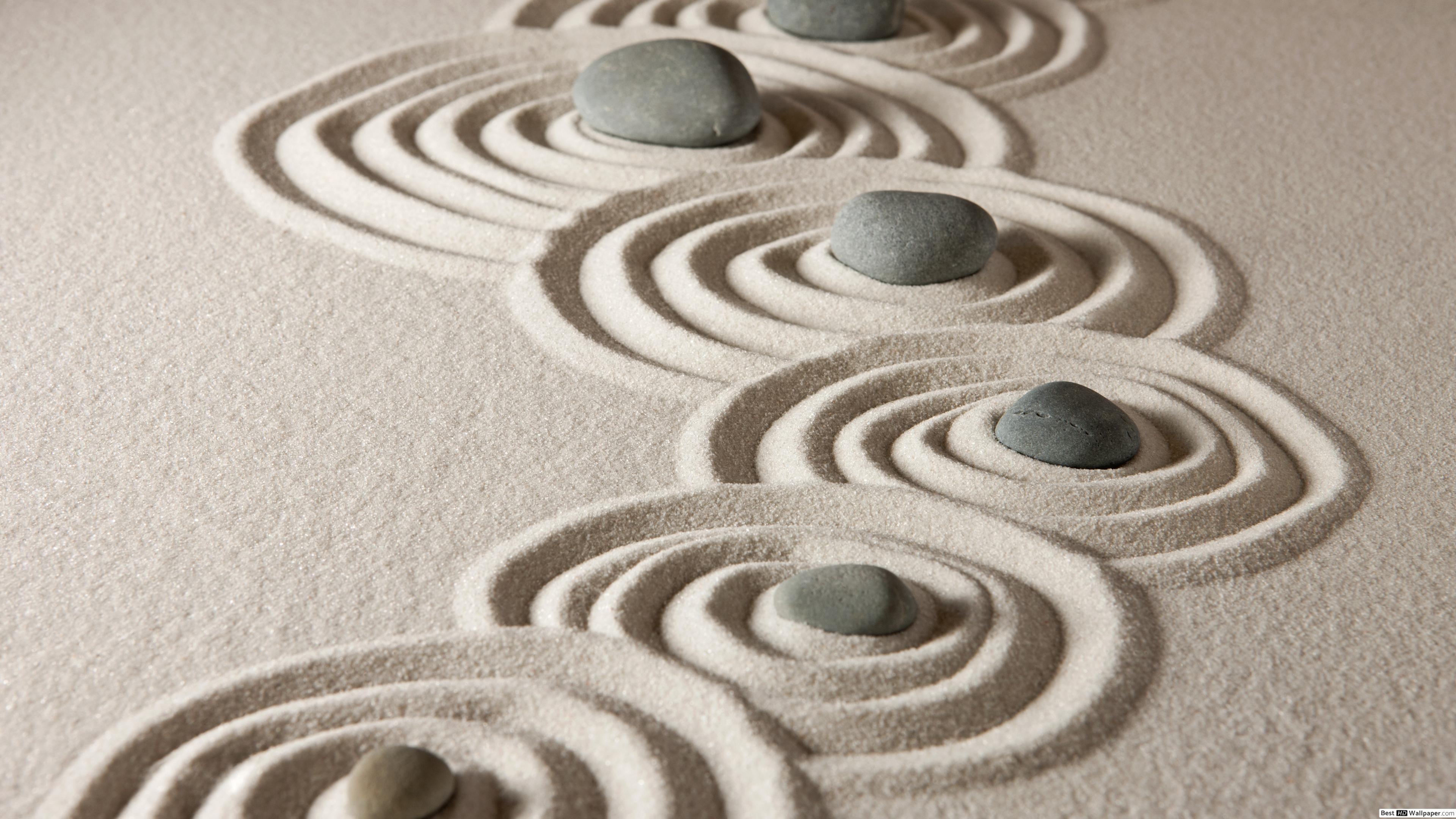 تصویر امواج دایره‌ ای از جنس سنگ و ماسه در باغ ذن برای Wallpaper