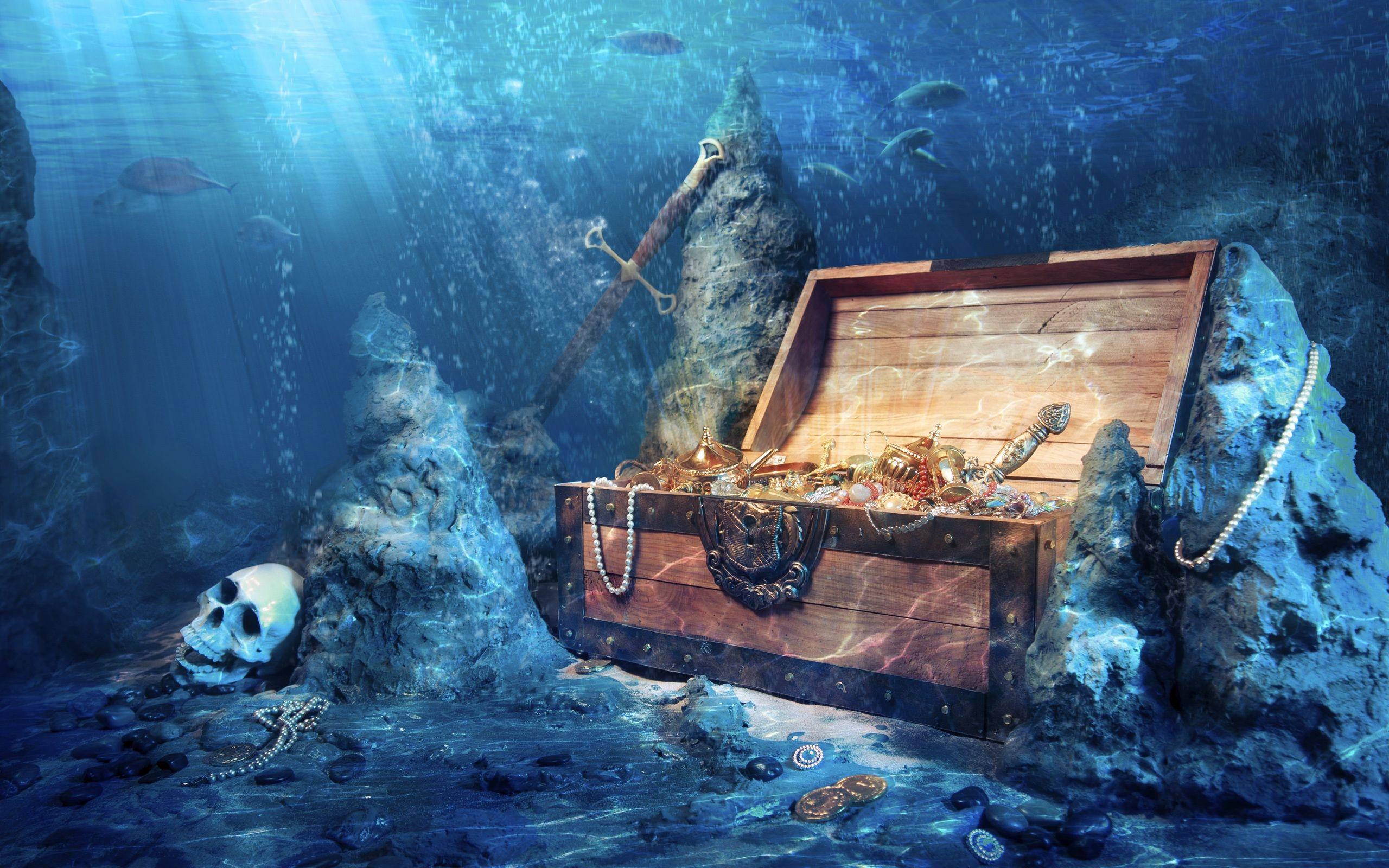 تصویر زمینه صندوقچه گنج فانتزی در اعماق دریا با طرح های باستانی رازآلود و علایم مخفی