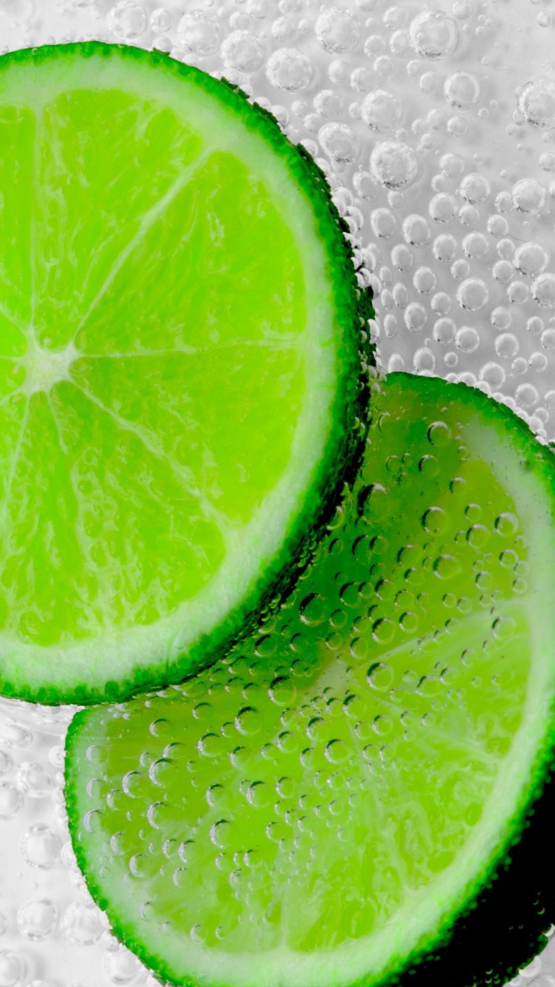 تصویر پس زمینه زیبا و جالب از لیمو ترش سبز رنگ با قطرات آب
