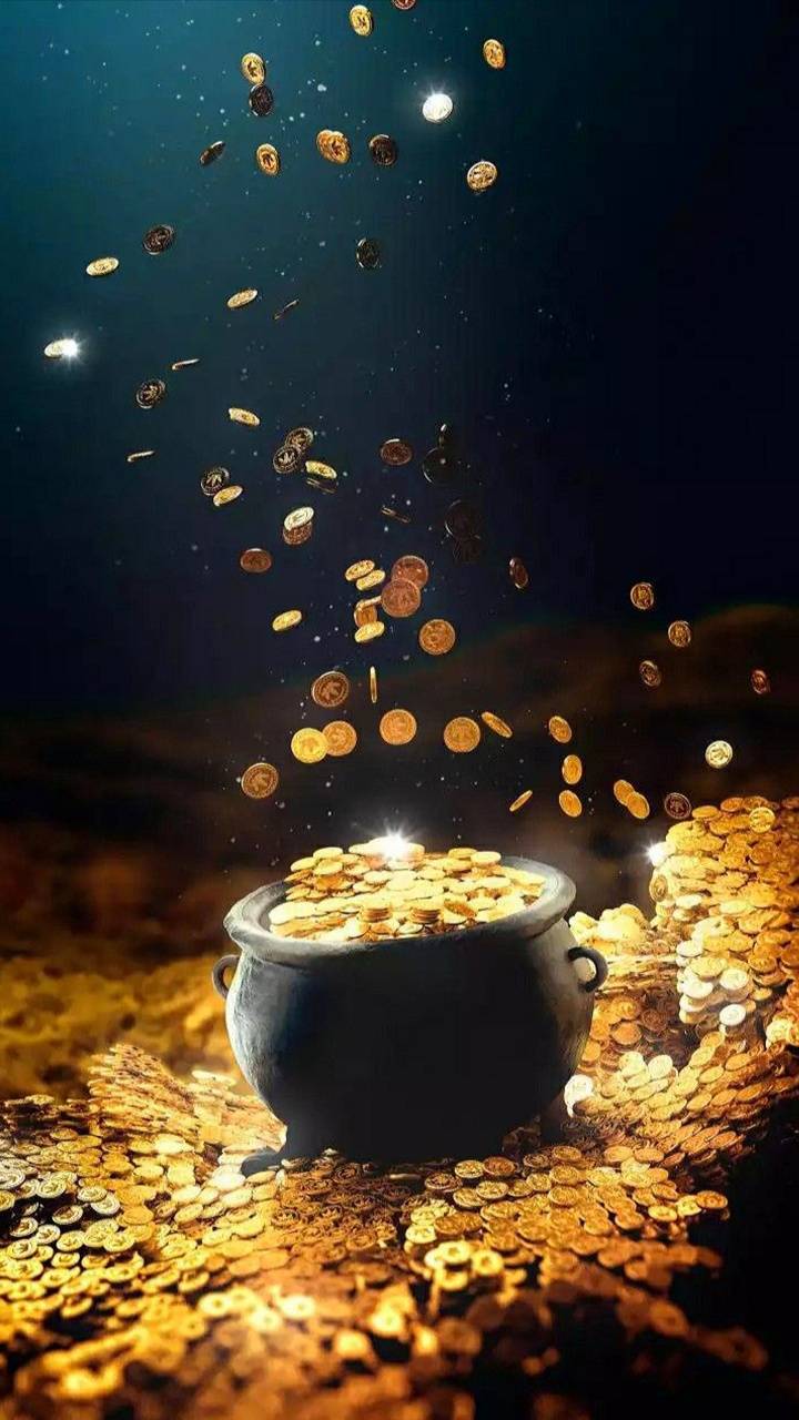 تصویر استوک سکه های درحال ریختن با پس زمینه نیمه تاریک 