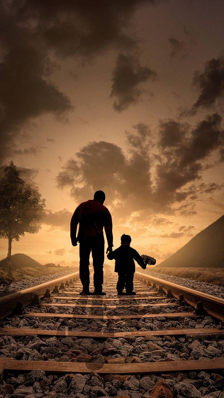 تصویر زمینه پرمعنا و عاطفی پدر در کنار پسرش فاقد متن 