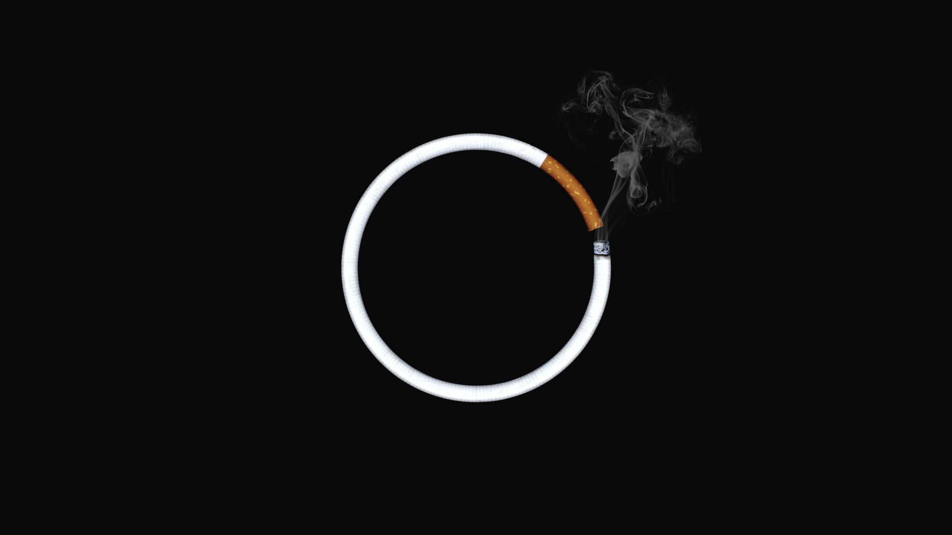 عکس پس زمینه بسیار جالب از یک سیگار دایره ای با بک گراند مشکی