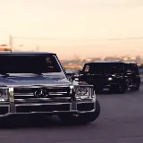 چاپ قاب موبایل و گوشی دانلود والپیپر مرسدس بنز G Class در غروب آفتاب حاشیه شهر