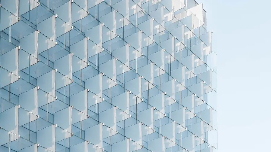 نمای شیشه ای پنجره های به هم پیوسته ساختمان های مدرن