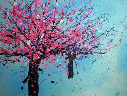 دانلود عکس درخت نقاشی شده با پاشیدن رنگ روی صفحه آبی