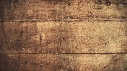 عکس استوک گرانج قدیمی تیره چوب روستیک با کاربرد شومینه و اجاق گازی هیزمی و دکوراسیون هماهنگ با طبیعت