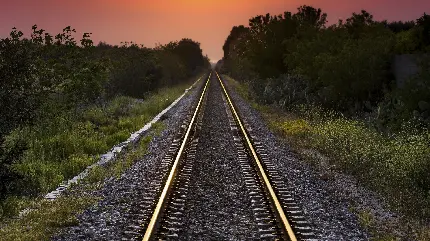 دانلود تصویر زمینه 4k و فول اچ دی ریل راه آهن هنگام غروب آفتاب 