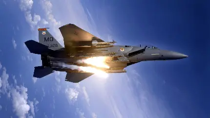دانلود تصویر زمینه هواپیما جنگنده در حال شلیک با کیفیت بالا
