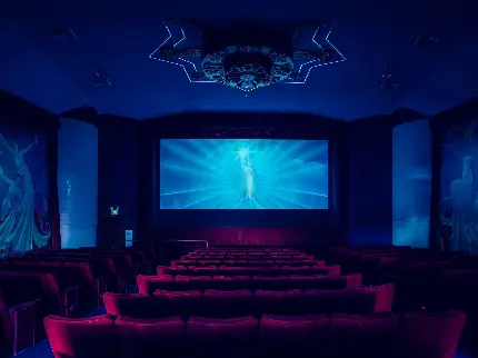 تصویر زمینه سینمای لاکچری و مدرن با صندلی های قرمز 