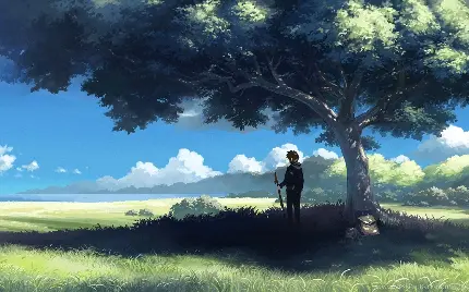 عکس مرد تنها زیر سایه درخت پر برگ و بار با آسمان آبی 