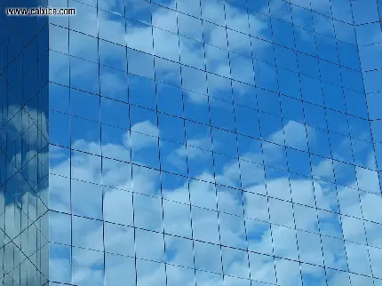عکس لعاب شیشه ای با معماری مدرن یک آسمان‌خراش 