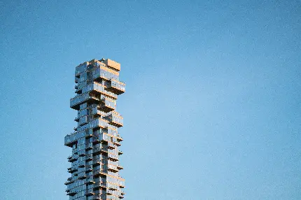 عکس استوک آسمان خراش مدرن مینیمالیستی برای ایده طراحی ساختمان