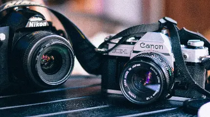 عکس پروفایل دوربین کانن Canon AE-1 از مدل های دوربین آنالوگ با قابلیت تبدیل زوم بیشتر در دوربین های دیجیتال 