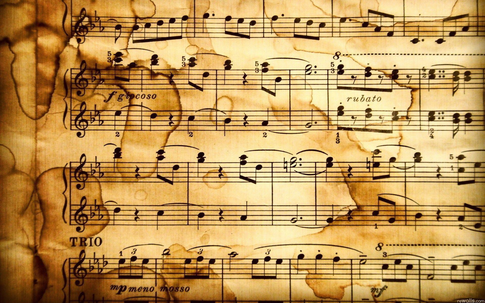 دانلود تصویر رایگان طرح نت موسیقی روی کاغذ قدیمی 