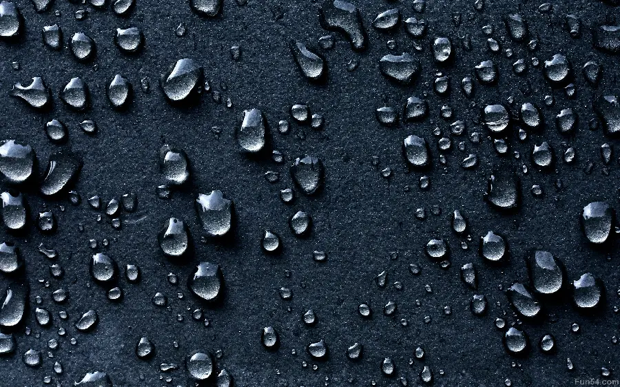 عکس قطره های آب بدون حرکت روی سطح پشمی
