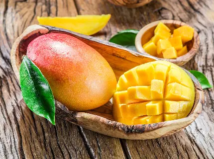 عکس انبه mango در ظرف چوبی بسیار زیبا با کیفیت عالی