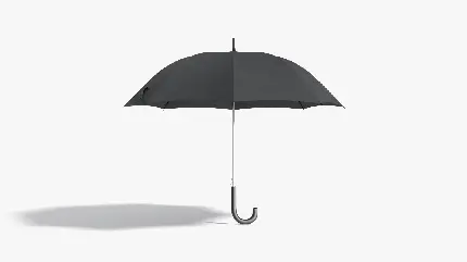 عکس مینیمال سایه چتر مشکی در محیطی سفید رنگ