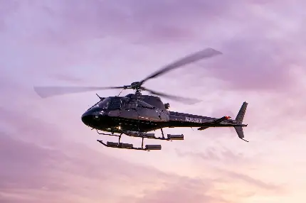 عکس فول اچ دی هلیکوپتر مشکی در آسمان صورتی مناسب پروفایل دختر های عشق خلبانی 