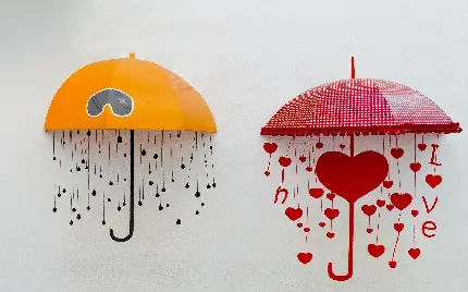 چتر های قرمز و نارنجی روی دیوار سفید با دیزاین فوق العاده زیبا