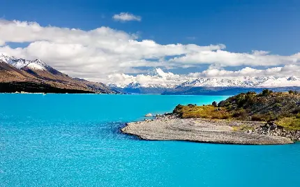 بهترین عکس طبیعت دریاچه پر آب میان کوهستان از نظر عکاسان 