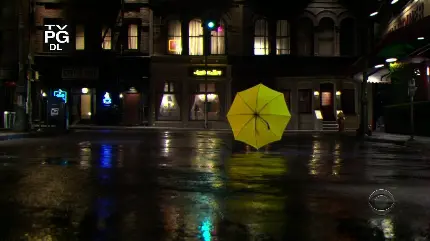 چتر زرد تنها زیر باران مخصوص محیط دسکتاپ
