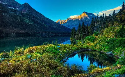 دانلود دریاچه شفاف و پر آب میان کوهستان مرتفع و سرسبز 