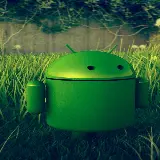 چاپ قاب موبایل و گوشی والپیپر ربات سبز اندروید در میان چمن ها مناسب گوشی جدید 2024