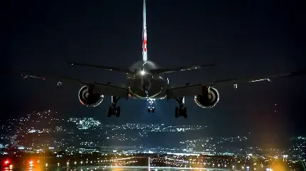 دانلود تصویر زمینه هوا فضا هواپیمای در حال فرود در باند فرودگاه