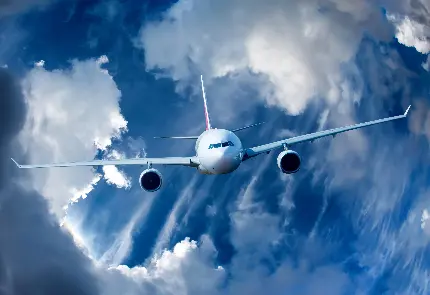 دانلود تصویر زمینه هواپیما در حال پرواز در کنار ابرها