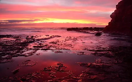 عکس منظر غروب خورشید نارنجی در سواحل استرالیا 8k