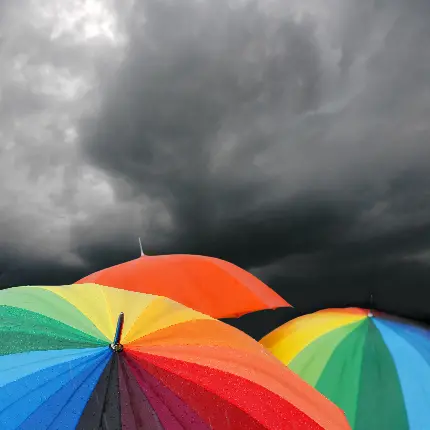 عکس زمینه رنگارنگ چتر های رنگارنگ