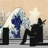 عکس نقاشی موج عظیم کاناگاوا روی دیوار پسر نشسته روی مبل